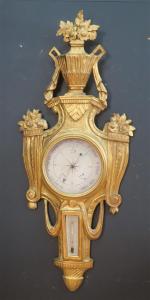 Baromètre d'époque Louis XVI en bois doré et sculpté d'un...