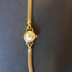 OMEGA : montre bracelet de dame en or 18 K,...