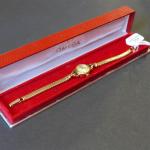 OMEGA : montre bracelet de dame en or 18 K,...