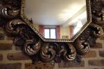Glace octogonale de style baroque italien en bois mouluré, sculpté,...