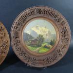 SUISSE : Deux plats ronds en bois à décor peint,...
