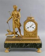 55 - Pendule d'époque Empire en bronze ciselé doré à...