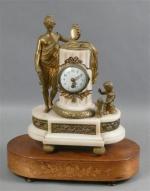 61 - Pendule de style Louis XVI en bronze et...