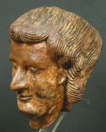 Petite tête d'homme en bois sculpté anciennement polychrome, travail Indo-Portugais...