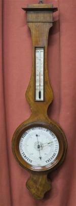Baromètre-thermomètre d'époque Napoléon III en placage d'acajou à filets, signé...