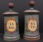 Paire de pots à tabac en bois peint, marqués "Tabac"...