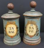 Paire de pots à tabac en bois peint, marqués "Tabac"...