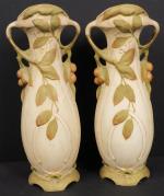 ROYAL DUX BOHEMIA : Paire de vases en biscuit polychrome...