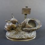 Dans le goût d'Auguste CAIN : Porte-allumettes en bronze patiné...