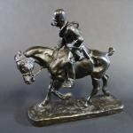 D'après Gaston d'ILLIERS (1876-1932) : Piqueux à cheval. Bronze patiné...
