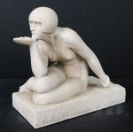 D'après Maurice GUIRAUD-RIVIERE : Enigma. Statue en pierre reconstituée, signée...