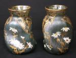 SAINT-DENIS : Paire de vases de forme  "cabossée" à...