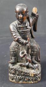 Statuette en bois sculpté représentant Chengwu, ép. XVIII'. Haut. :...