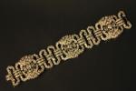 Bracelet articulé en platine, composé de motifs de forme géométrique...