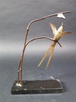 BECQUEREL André-Vincent (1893-1981). Oiseau branché et insecte. Bronze patiné (oxydation)...