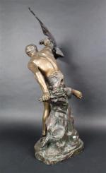 DROUOT Edouard (1859-1945) : Prométhée et l'aigle. Bronze patiné, signé....
