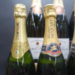 Champagne. 9 bouteilles de champagne dépareillées comprenant : quatre bouteilles...