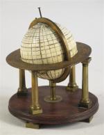 48 - Petit globe céleste en ivoire, avec table équatoriale...