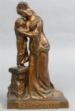 64 - FAVRE Maurice (1875-1915) : Amour maternel. Bronze patiné,...