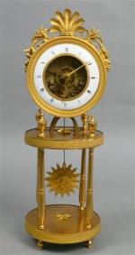 107 - Pendule-squelette d'époque Directoire en bronze doré, cadran-anneau en...