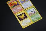 The Pokémon company 
Contenu : lot de 4 rares dont Elector,...