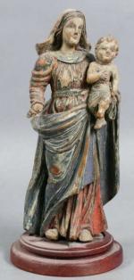 23 - Vierge à l'Enfant en bois sculpté peint, ép....