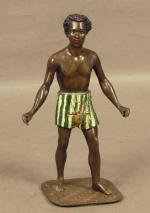 73 - Sujet en bronze patiné et peint représentant un...