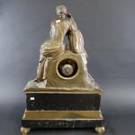 Pendule d'époque XIX's en bronze sur base en marbre noir...