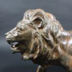 CHENET Pierre (XX's) : Lion rugissant. Bronze à patine nuancée,...