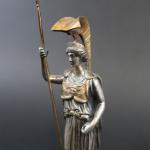 Statuette en bronze argenté et doré représentant Minerve, sur socle...