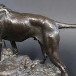 LECOURTIER Prosper (1851-1924) : Chien de chasse rapportant un lièvre....