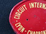 Circuit international Lyon Charbonnières. Plaque en tôle de forme ovale,...