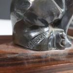 MOREAU H. (XXème) Serre-livre en métal argenté à décor d'éléphants...