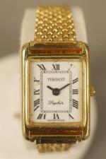 TISSOT - Montre bracelet de dame en or jaune 18ct,...