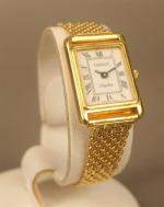 TISSOT - Montre bracelet de dame en or jaune 18ct,...