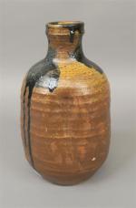 DOY (XX's). Vase bouteille en grès émaillé à décor de...