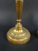 Paire de flambeaux d'époque Louis XVI en bronze doré à...