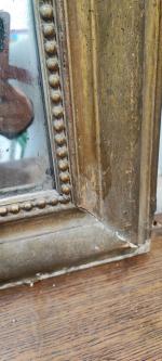 Ancien miroir de cheminée 117cm x 78cm.
Usure, manques, miroir désargenté...