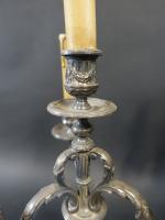 Paire de candélabres à quatre lumières de style Louis XVI...