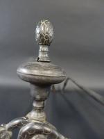 Paire de chenets Louis XIV en bronze patiné à décor...