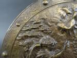 D'après Léonard MOREL-LADEVIL (1820-1888). Médaillon rond en bronze patiné à...