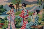 Cadre canevas en laine. Scène animée de geishas au pied...
