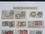 1 chemise d'Alsace lorraine avec 1 page de fragments de...