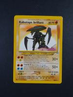 Carte Pokemon
Contenu : 1 carte rare Kabutops brillant 
Edition : Réédition Neo...