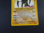 Carte Pokemon
Contenu : 1 carte rare Kabutops brillant 
Edition : Réédition Neo...
