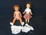 Deux poupées baigneurs en composition 
(Haut.: 50 cm)