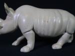 ASIE XX's. Rhinoceros en pierre polie beige. Haut.: 15 cm...