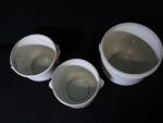 LIMOGES - Lot de trois pots en porcelaine comprenant :...