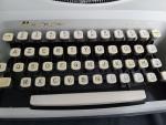 Vintage machine à écrire portative de marque Remington ENVOY non...