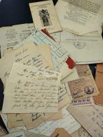 Lot de correspondance, papiers d'identité, un cahier manuscrit rempli à...